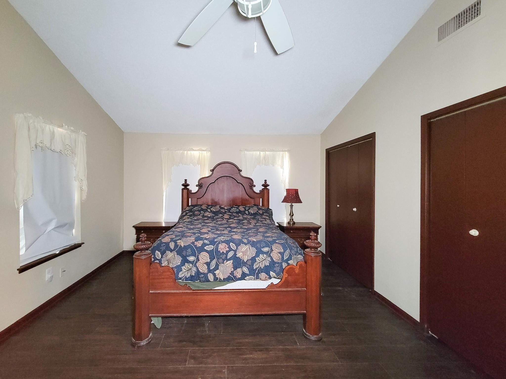 50 Sportsman Trail Coldspring, TX 77331 - Photo 9 of 42 a room with a bed and wooden floor