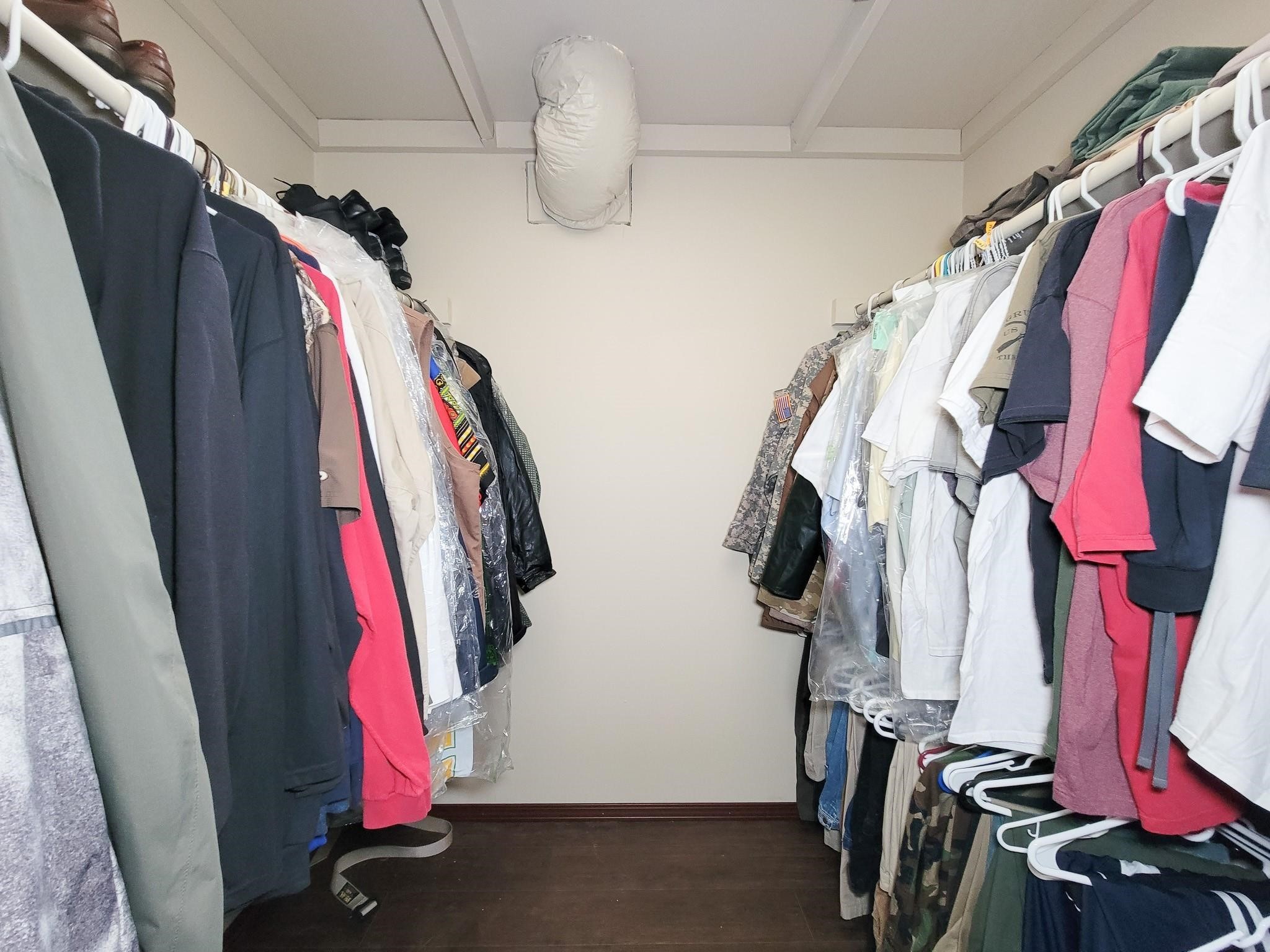 50 Sportsman Trail Coldspring, TX 77331 - Photo 10 of 42 a view of walk in closet with clothes and shoes