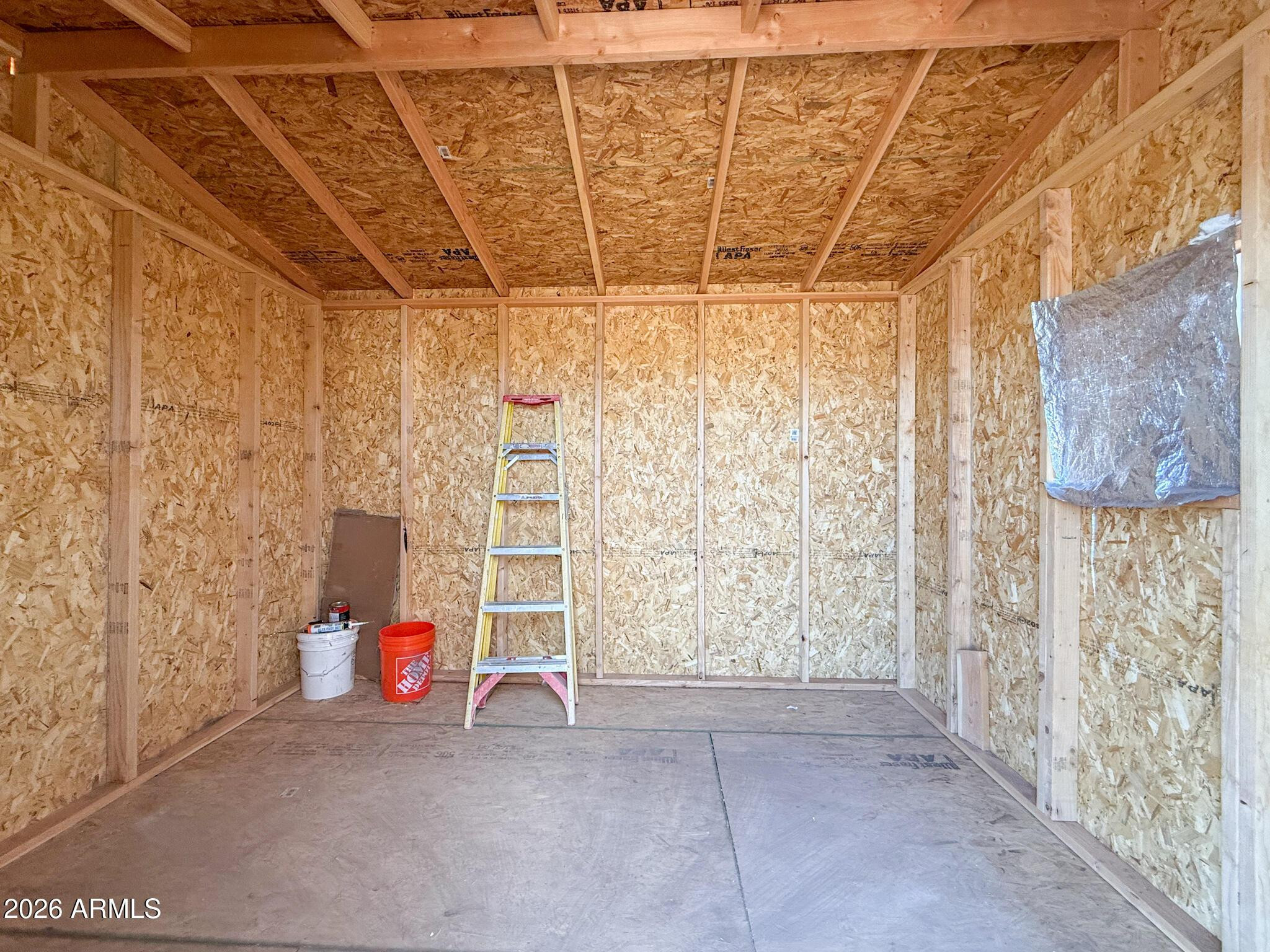 51880 North Gold Plains Road Seligman, AZ 86337 - Photo 24 of 24 a view of an empty room with a window