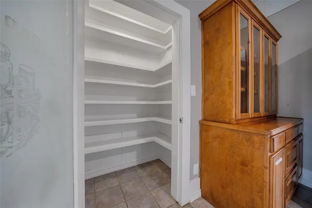 a view of storage and utility room with washer and dryer
