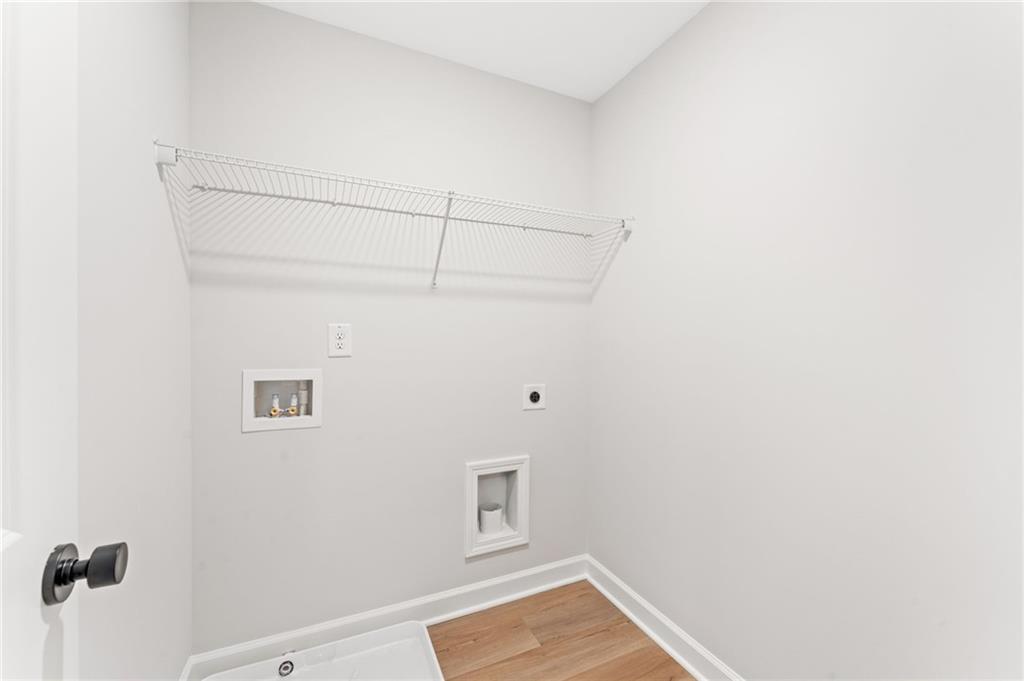 328 Colsen Drive Acworth, GA 30102 - Photo 22 of 28 a view of a room with racks on the wall