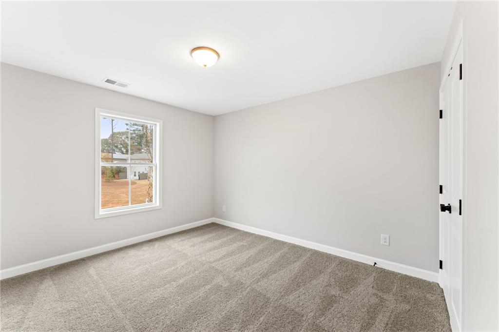 328 Colsen Drive Acworth, GA 30102 - Photo 24 of 28 an empty room with a window