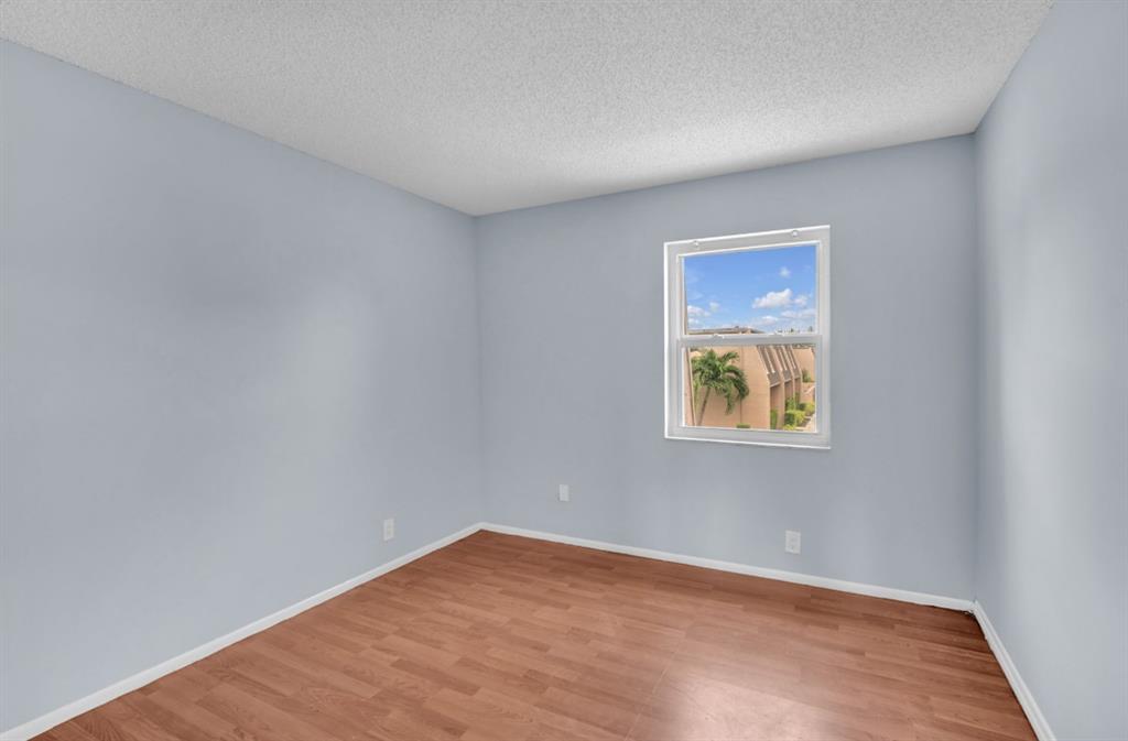 1321 Partridge Close, Unit 60 Pompano Beach, FL 33064 - Photo 16 of 28 a view of an empty room