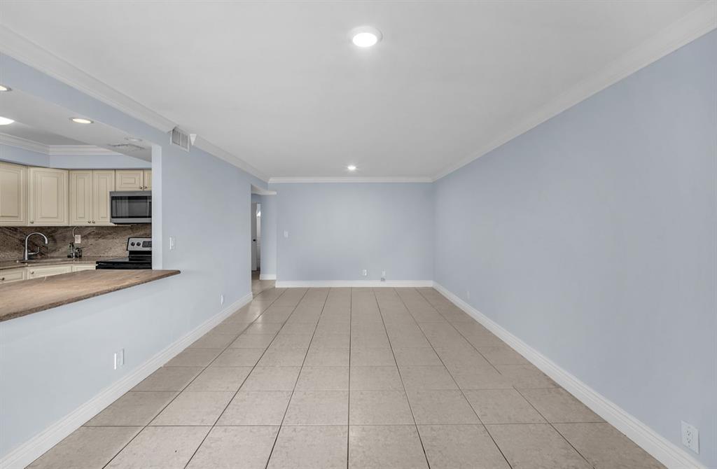 1321 Partridge Close, Unit 60 Pompano Beach, FL 33064 - Photo 8 of 28 a view of a kitchen with a sink and a stove top oven