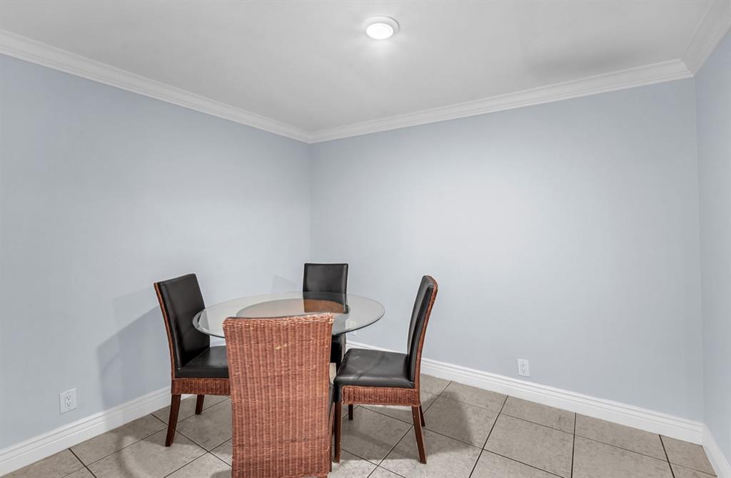1321 Partridge Close, Unit 60 Pompano Beach, FL 33064 - Photo 10 of 28 a work place with a chair and a table