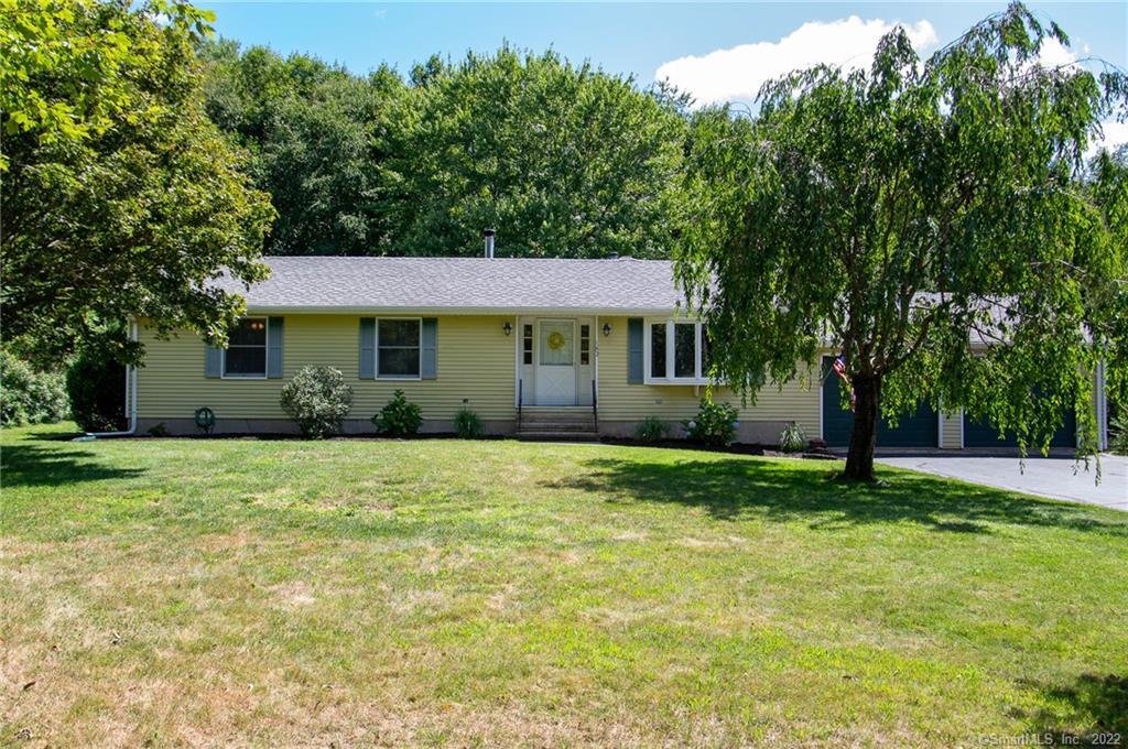 front exterior/spacious yard!