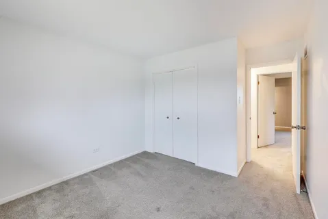 a view of a room with a hallway