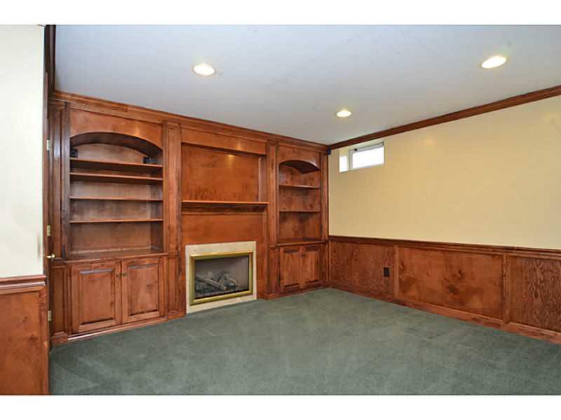 342 Indian Ridge Drive Coraopolis, PA 15108 - Photo 19 of 25 Basement/Game Room. This room in the basement is a great space to enjoy a warm fire.
