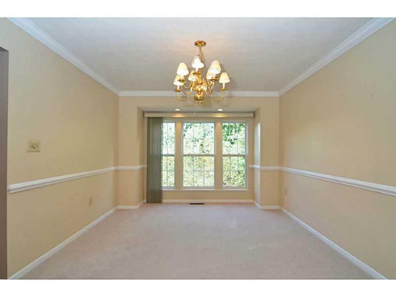 342 Indian Ridge Drive Coraopolis, PA 15108 - Photo 8 of 25 Dining Room. The dining room includes crown molding and a chair rail.