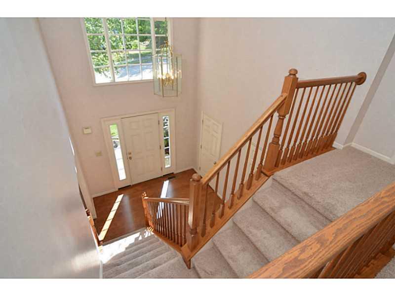 342 Indian Ridge Drive Coraopolis, PA 15108 - Photo 10 of 25 Entry/Foyer. The open foyer offers a grand staircase.