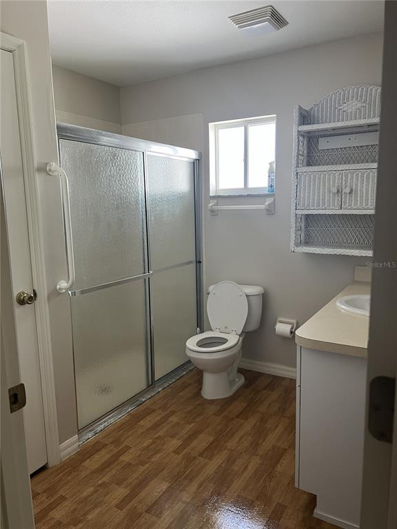 6035 Southwest 98th Street Road Ocala, FL 34476 - Photo 12 of 15 a bathroom with a toilet and a shower