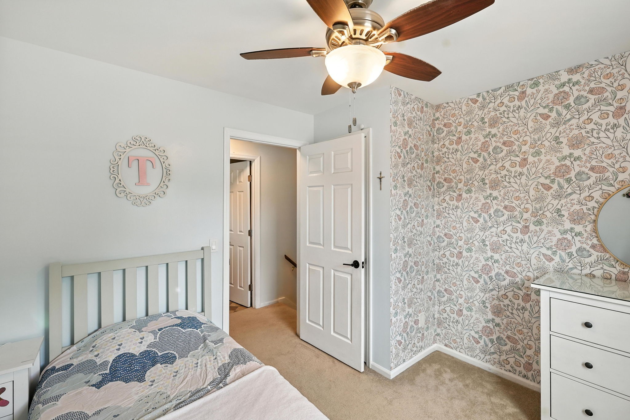 763 Bellevue Road Nashville, TN 37221 - Photo 12 of 24 a bedroom with a bed and a chandelier fan