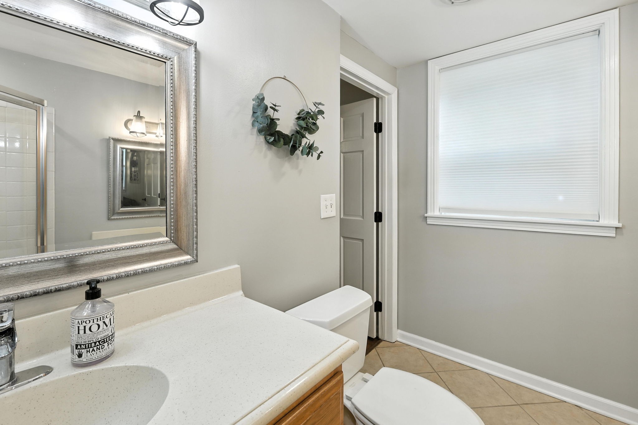 763 Bellevue Road Nashville, TN 37221 - Photo 20 of 24 a bathroom with a sink toilet and shower