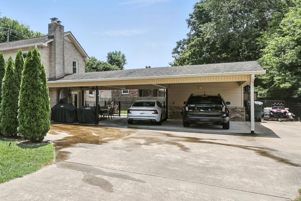 763 Bellevue Road Nashville, TN 37221 - Photo 21 of 24 a view of a car parked in front of a house