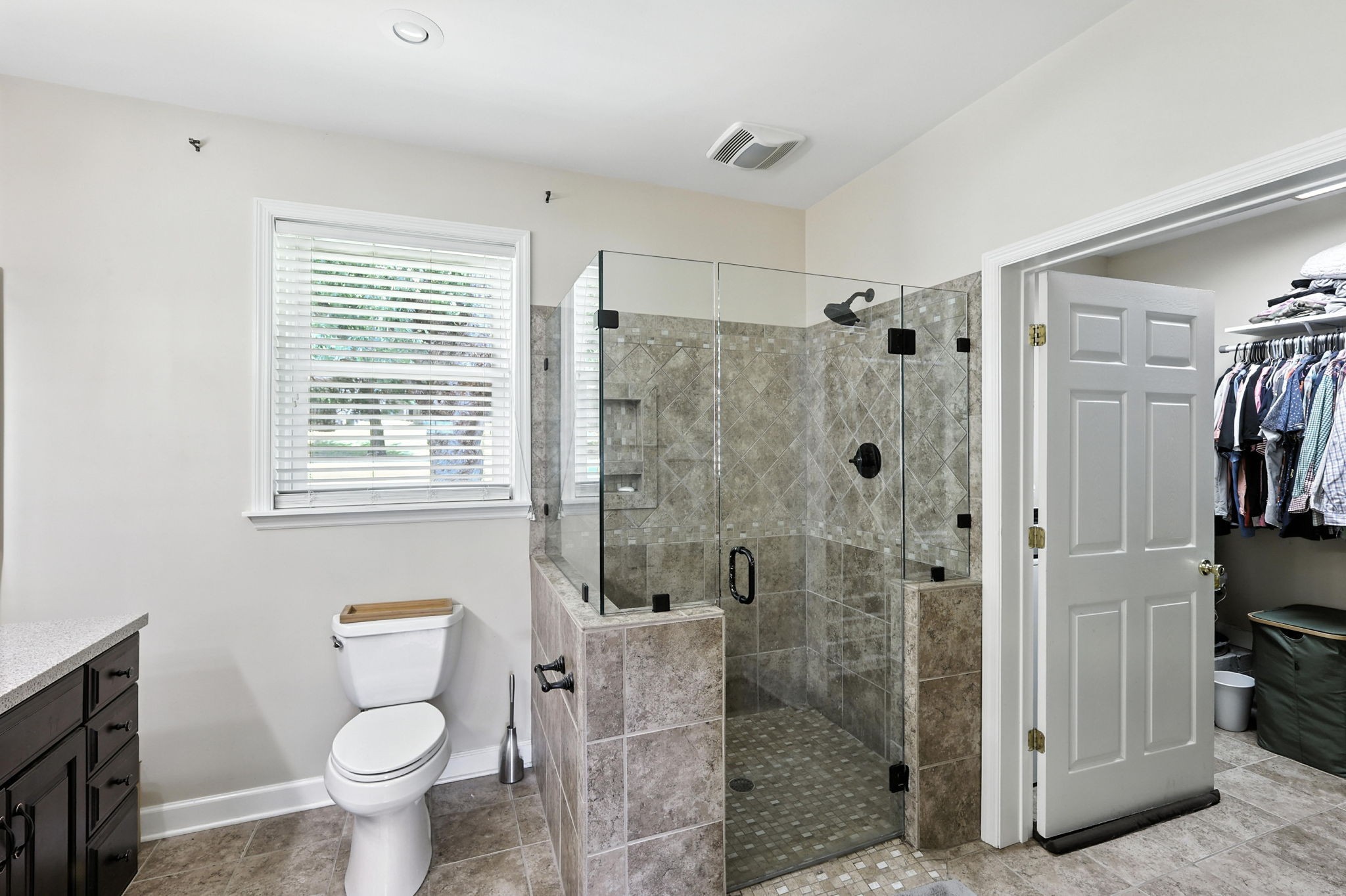 763 Bellevue Road Nashville, TN 37221 - Photo 10 of 24 a bathroom with a shower a toilet and a sink