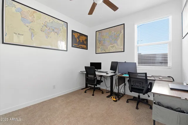 a view of a house with backyard sitting area and garden
