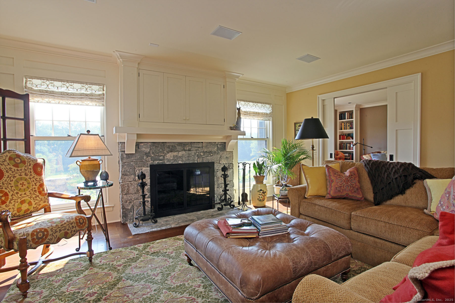 103 B Chalybes Road West Roxbury, CT 06783 - Photo 11 of 38 a living room with furniture and a fireplace