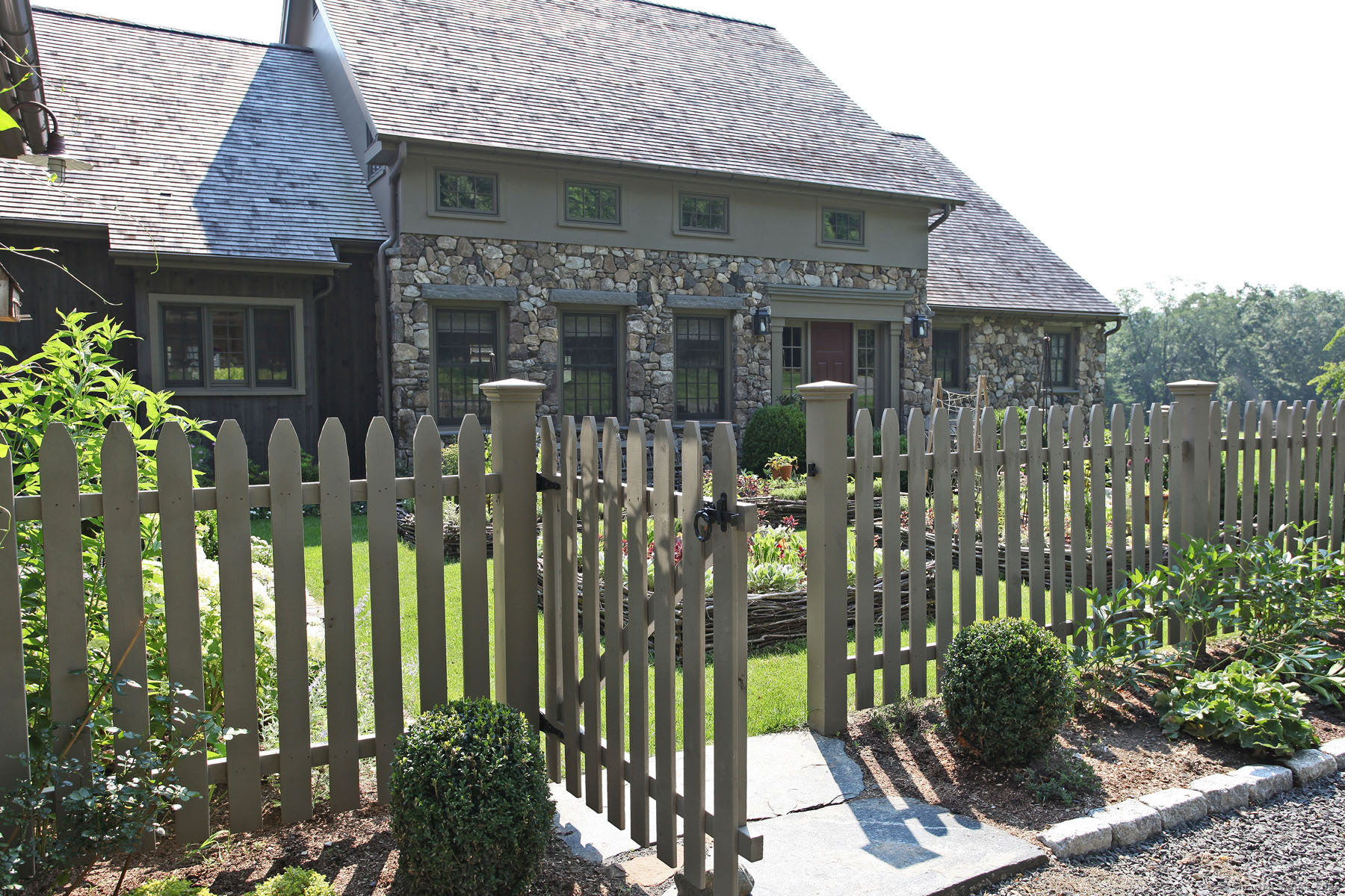 103 B Chalybes Road West Roxbury, CT 06783 - Photo 2 of 38 a front view of a house with a garden