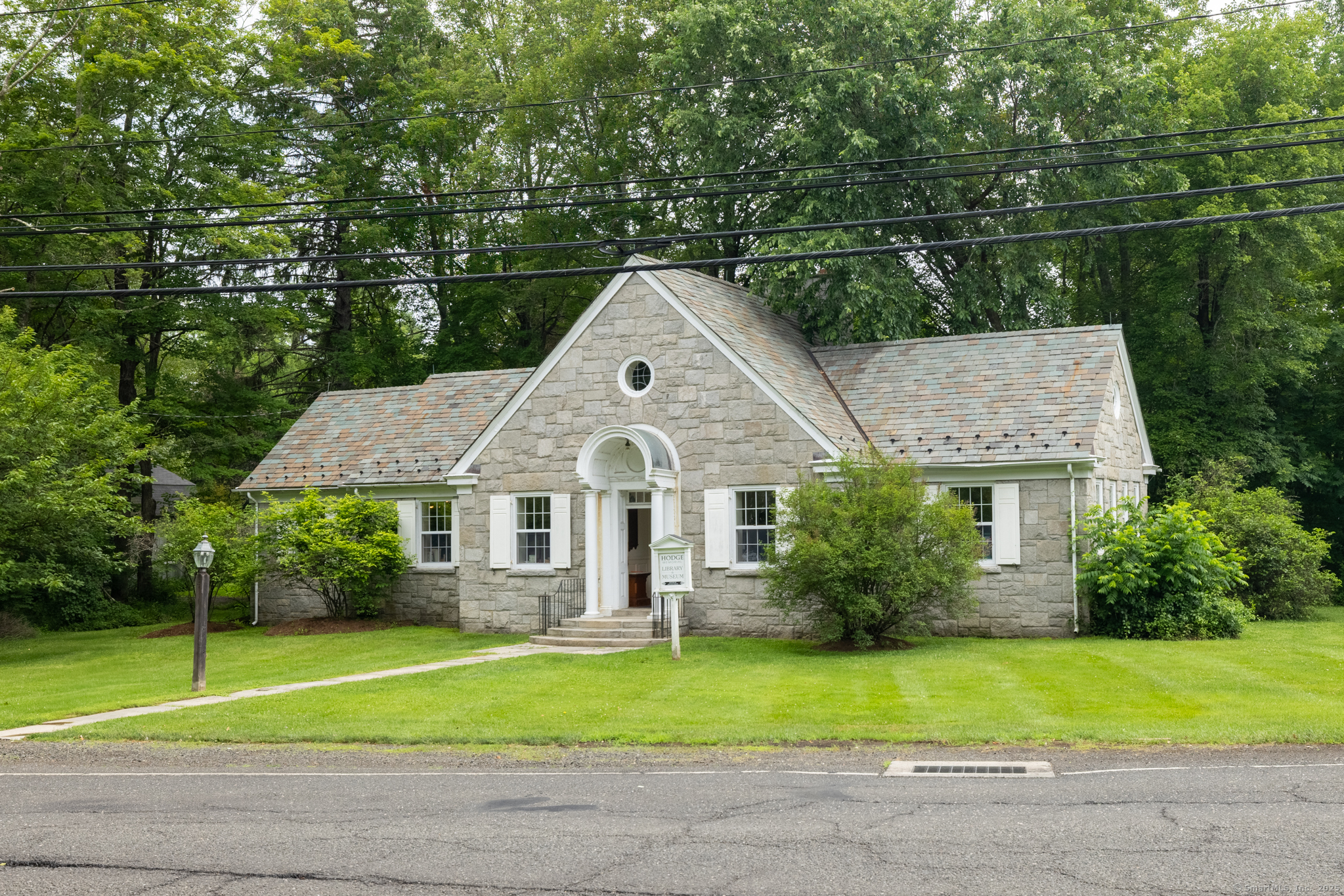 103 B Chalybes Road West Roxbury, CT 06783 - Photo 31 of 38 a front view of a house with a yard and trees