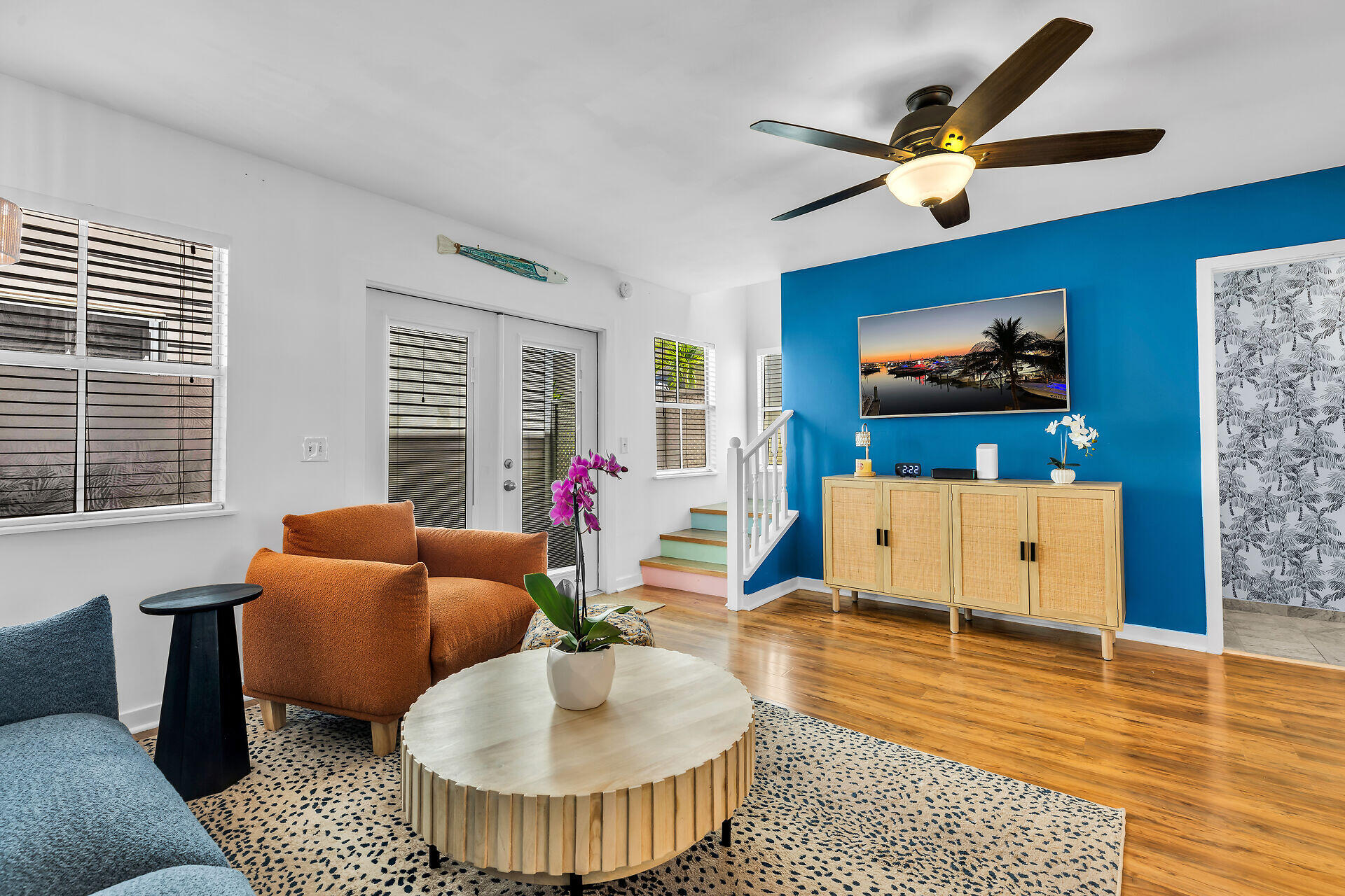 1075 Duval Street, Unit R10 Key West, FL 33040 - Photo 20 of 38 a living room with furniture and a flat screen tv
