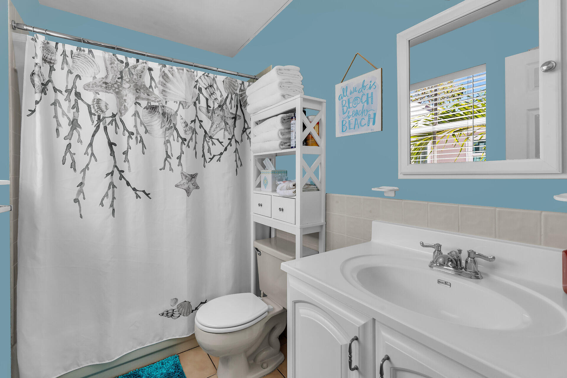 1075 Duval Street, Unit R10 Key West, FL 33040 - Photo 27 of 38 a bathroom with a sink toilet and shower