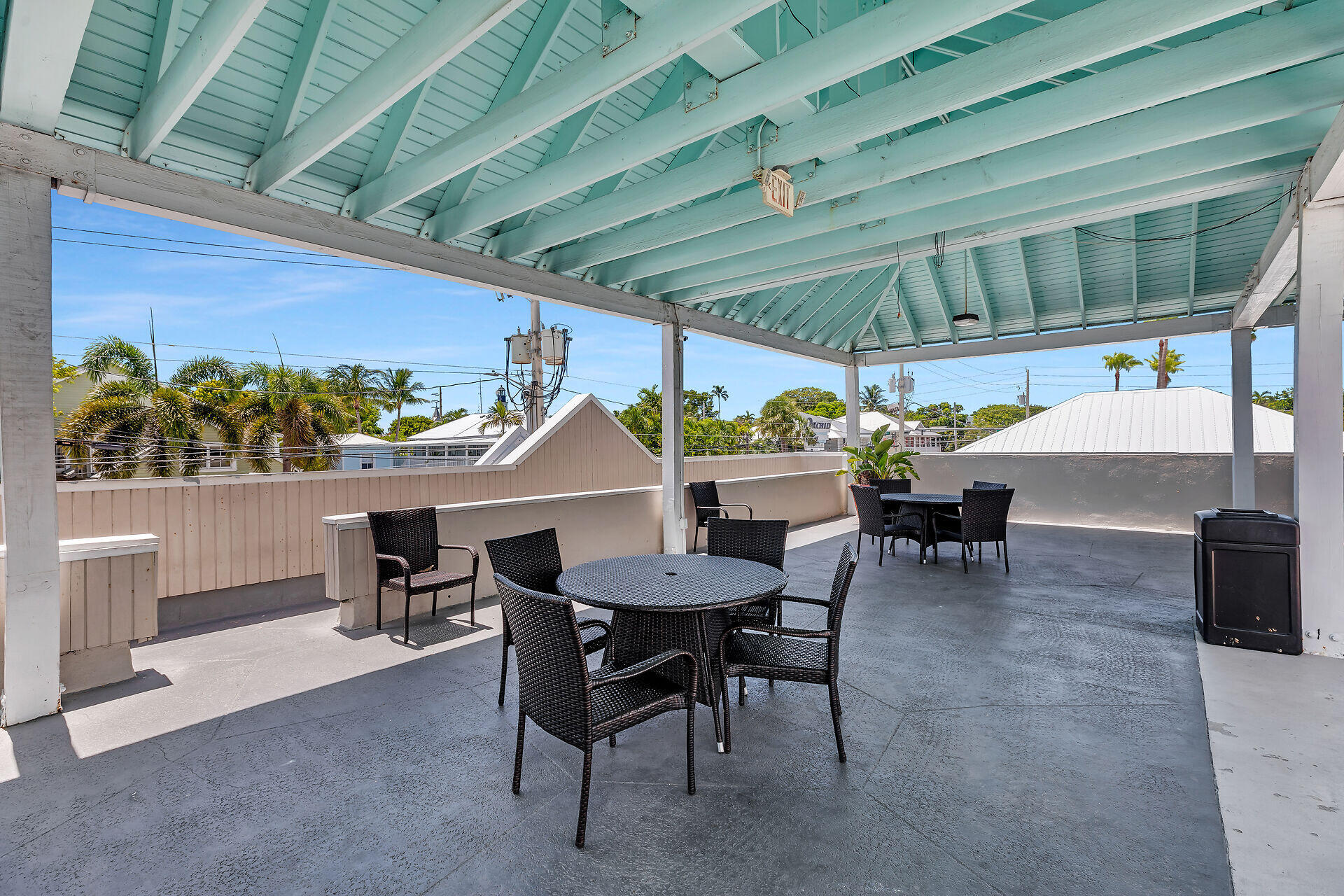 1075 Duval Street, Unit R10 Key West, FL 33040 - Photo 31 of 38 a view of a table and chairs in patio
