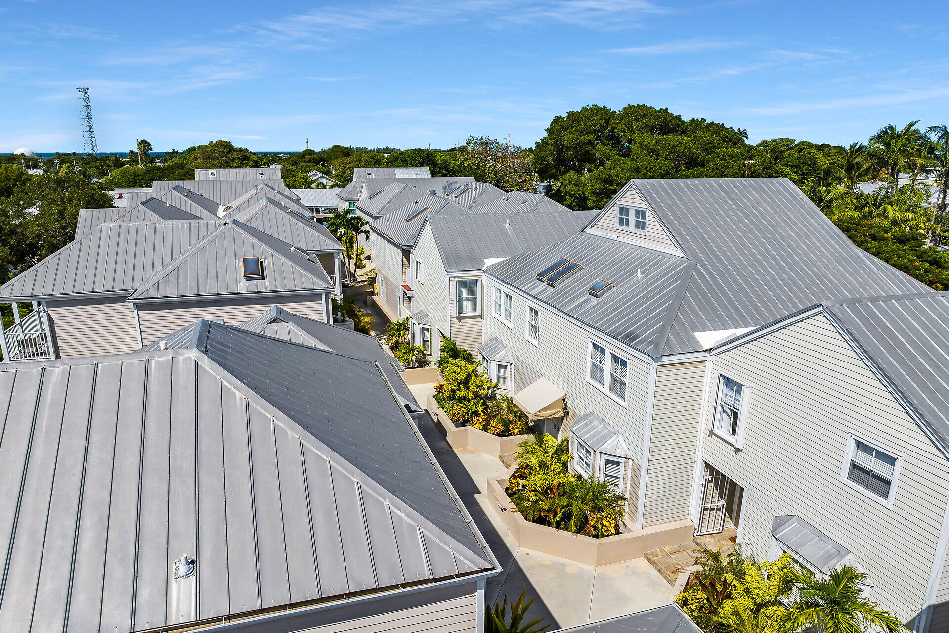 1075 Duval Street, Unit R10 Key West, FL 33040 - Photo 35 of 38 an aerial view of multiple houses with a yard