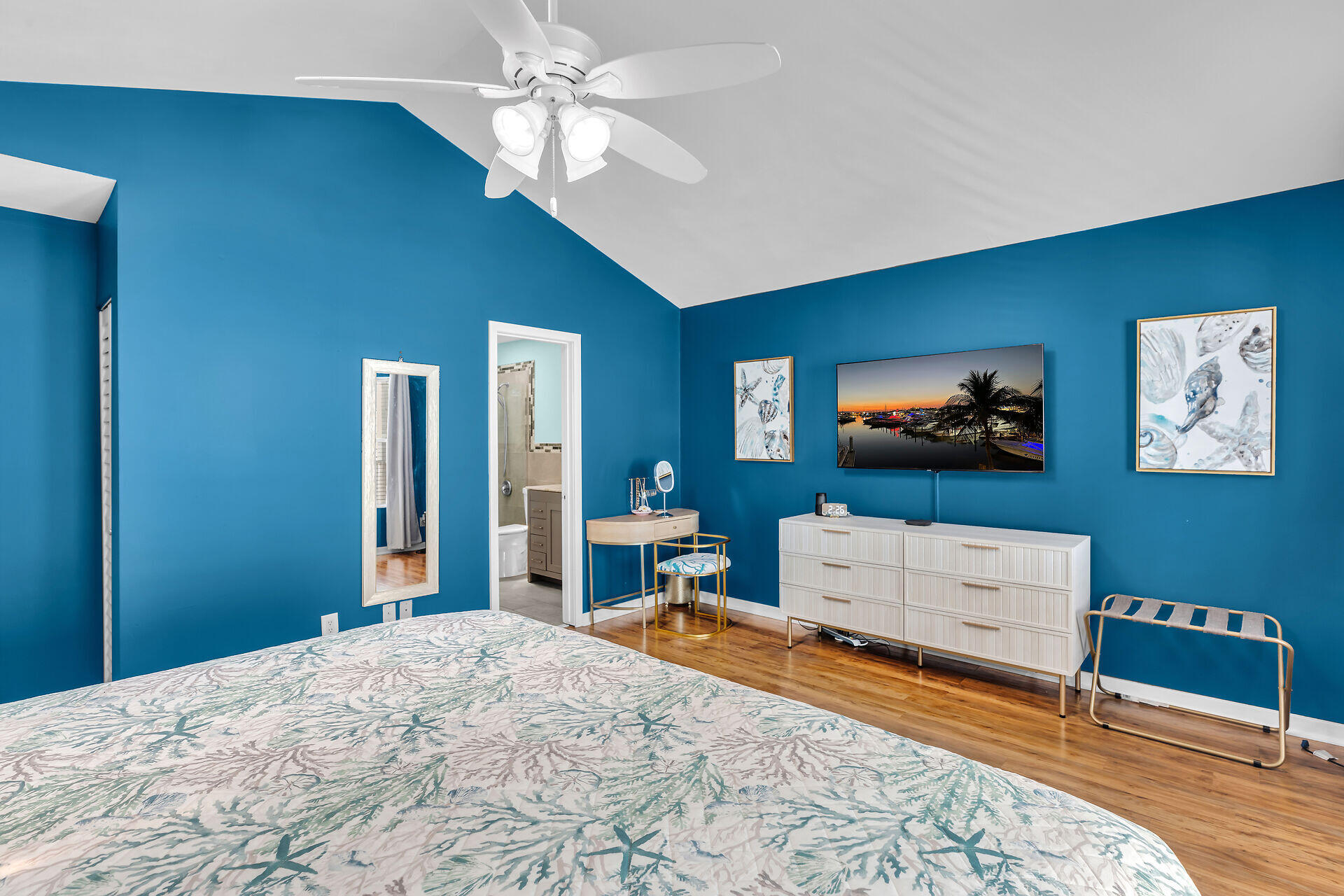 1075 Duval Street, Unit R10 Key West, FL 33040 - Photo 4 of 38 a bedroom with a bed and a flat screen tv