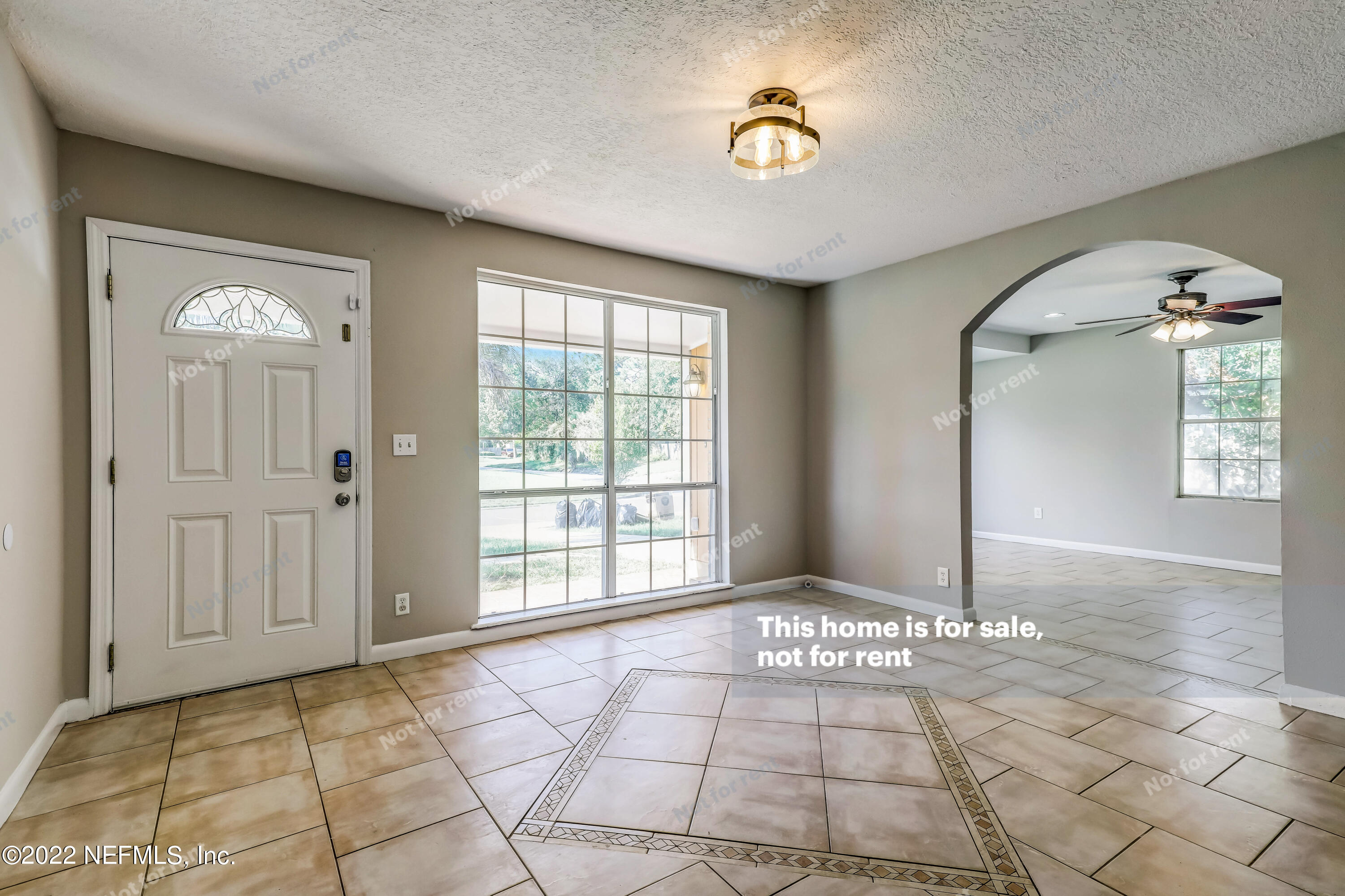 7403 Sandhurst Road South Jacksonville, FL 32277 - Photo 5 of 29 a view of an empty room with window