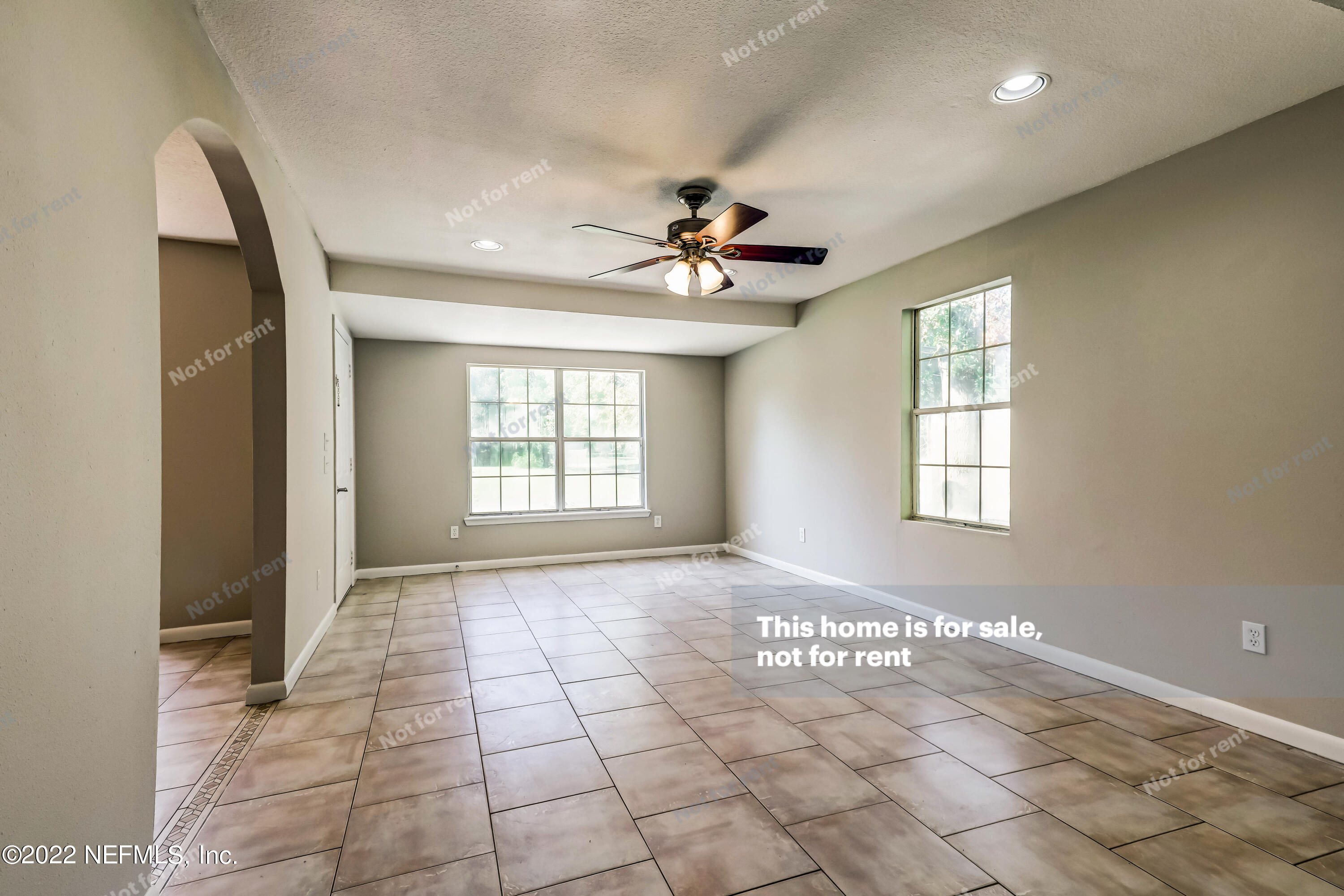 7403 Sandhurst Road South Jacksonville, FL 32277 - Photo 6 of 29 a view of an empty room with a window
