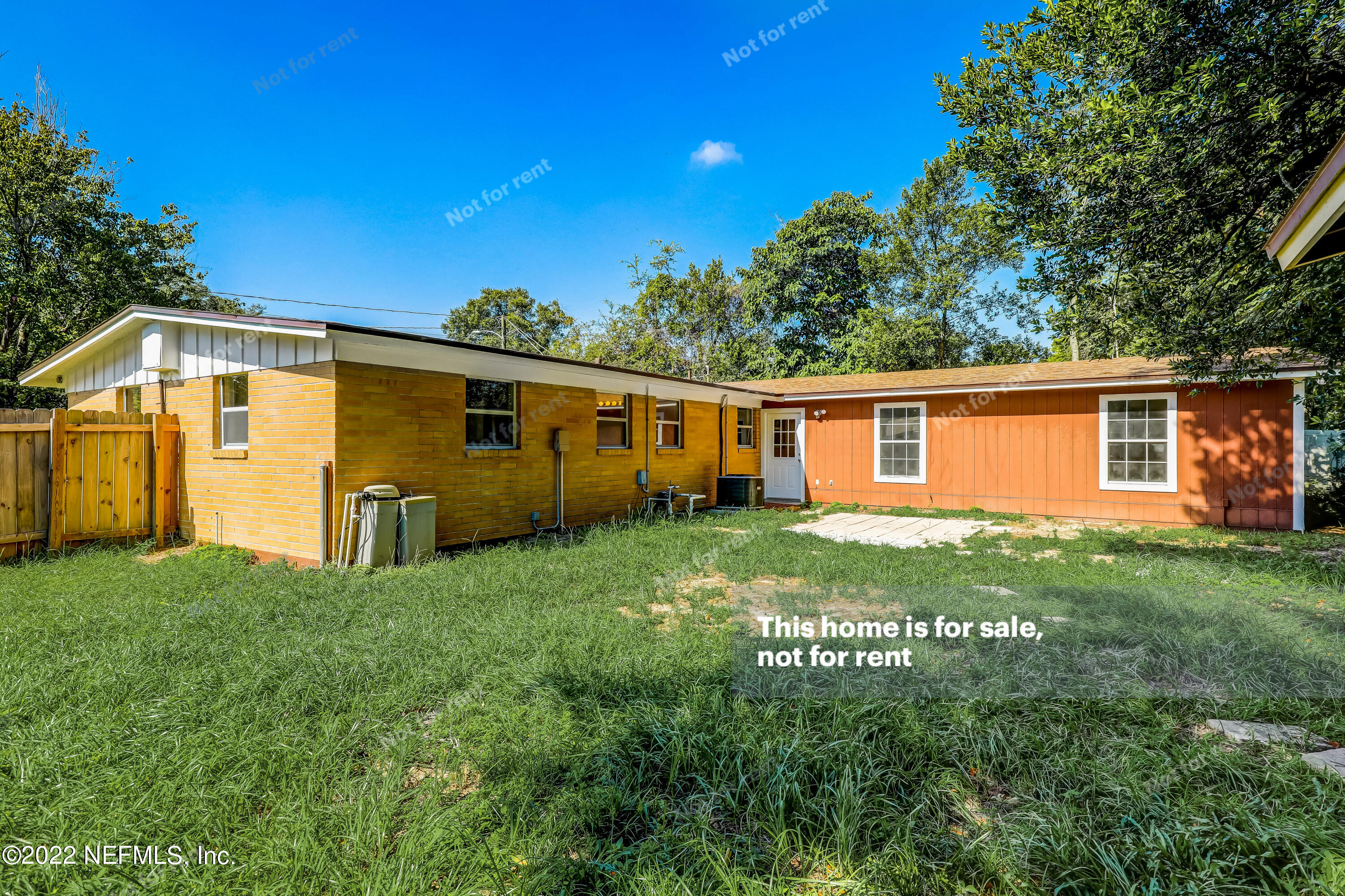 7403 Sandhurst Road South Jacksonville, FL 32277 - Photo 9 of 29 a view of a house with backyard