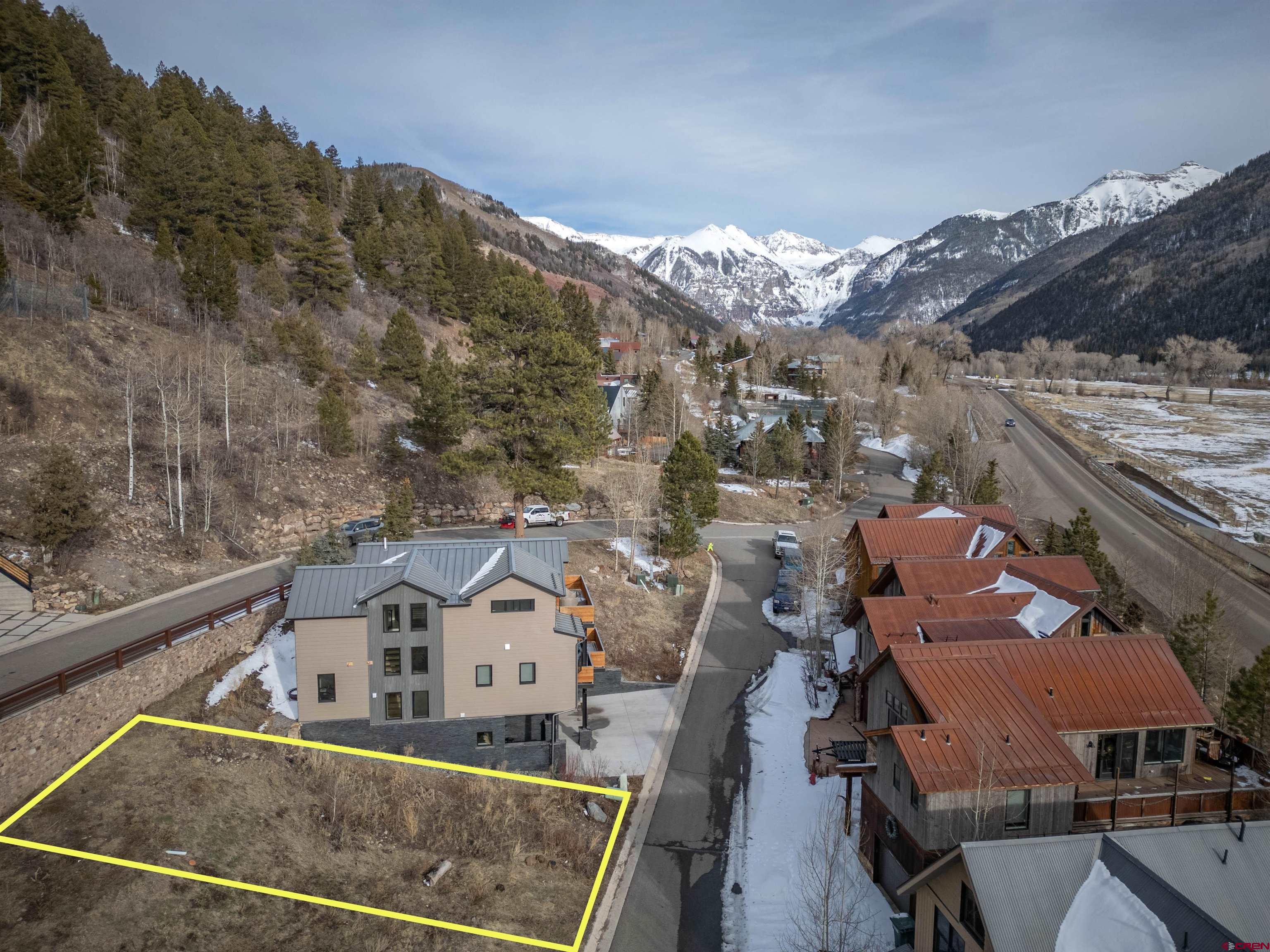Tbd Sunset Rdg Drive Telluride, CO 81435 - Photo 2 of 9 an aerial view of a house with a mountain