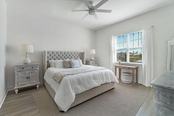 a bedroom with a bed and a cabinets
