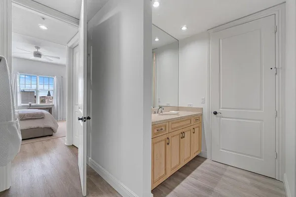 a bathroom with a double vanity sink and mirror