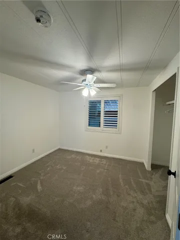 en empty room with windows