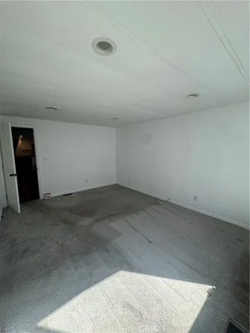 an empty room with an entryway