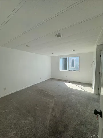 a view of a room that has a window