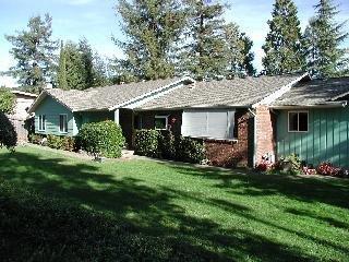 535 Los Alamos Road Santa Rosa, CA 95409 - Photo 1 of 8 a front view of a house with a garden