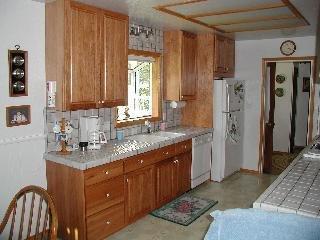 535 Los Alamos Road Santa Rosa, CA 95409 - Photo 3 of 8 a kitchen with a sink stove and refrigerator