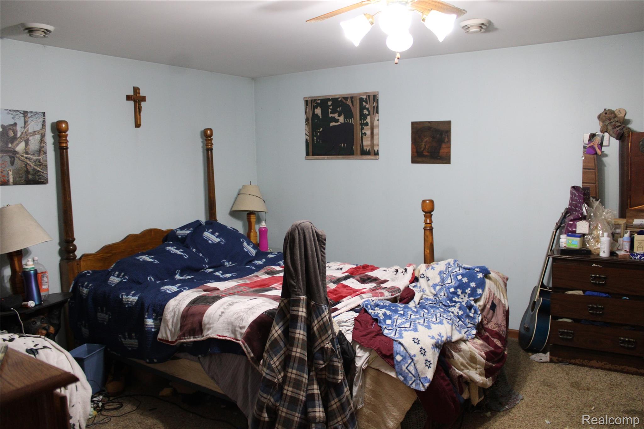 4870 Samaria Road Petersburg, MI 49270 - Photo 11 of 37 Bedroom with carpet flooring and ceiling fan