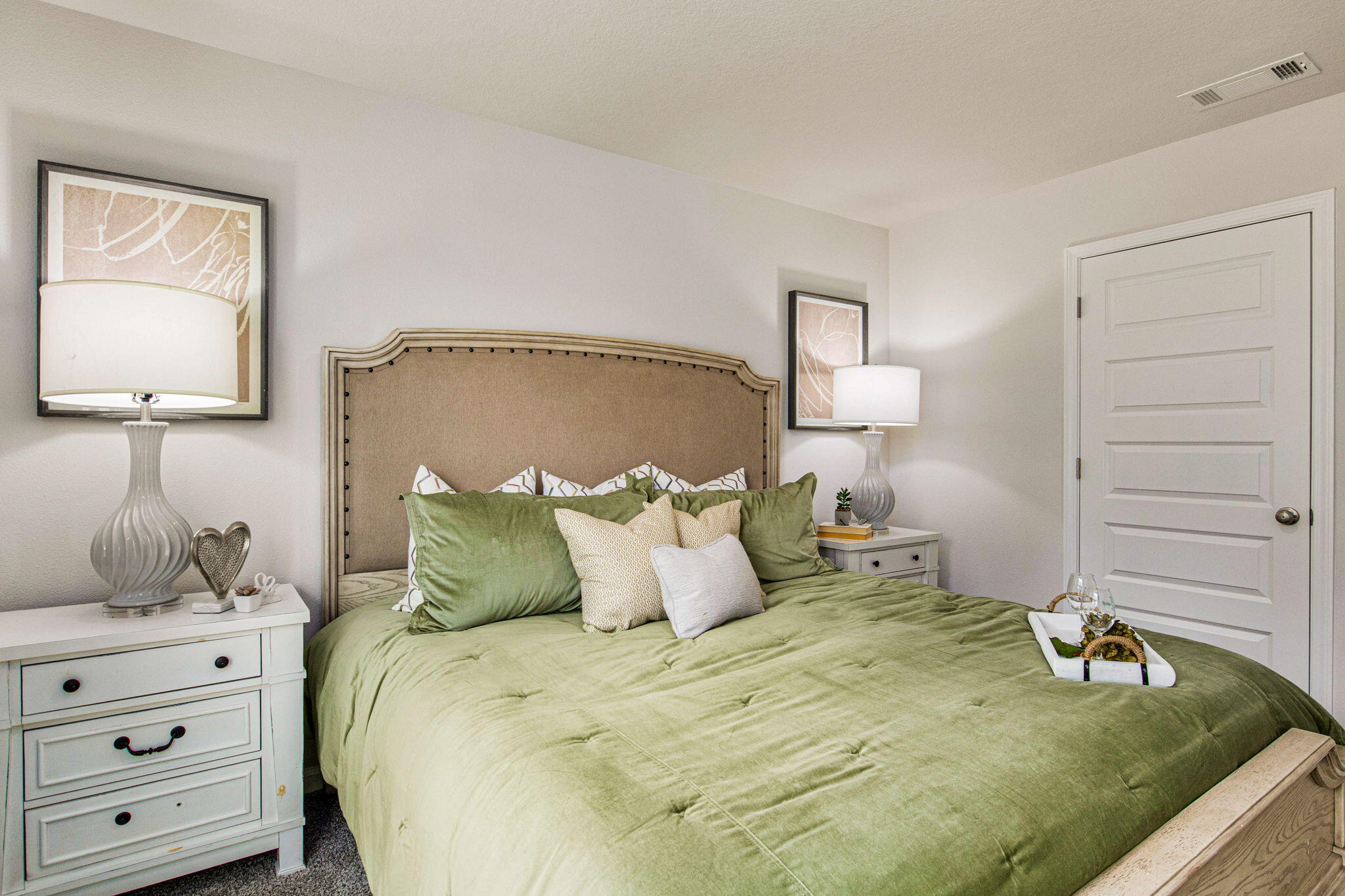 3064 Jane Lane Crestview, FL 32539 - Photo 11 of 33 a bedroom with a bed and a night stand