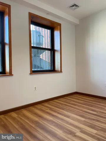 an empty room with window