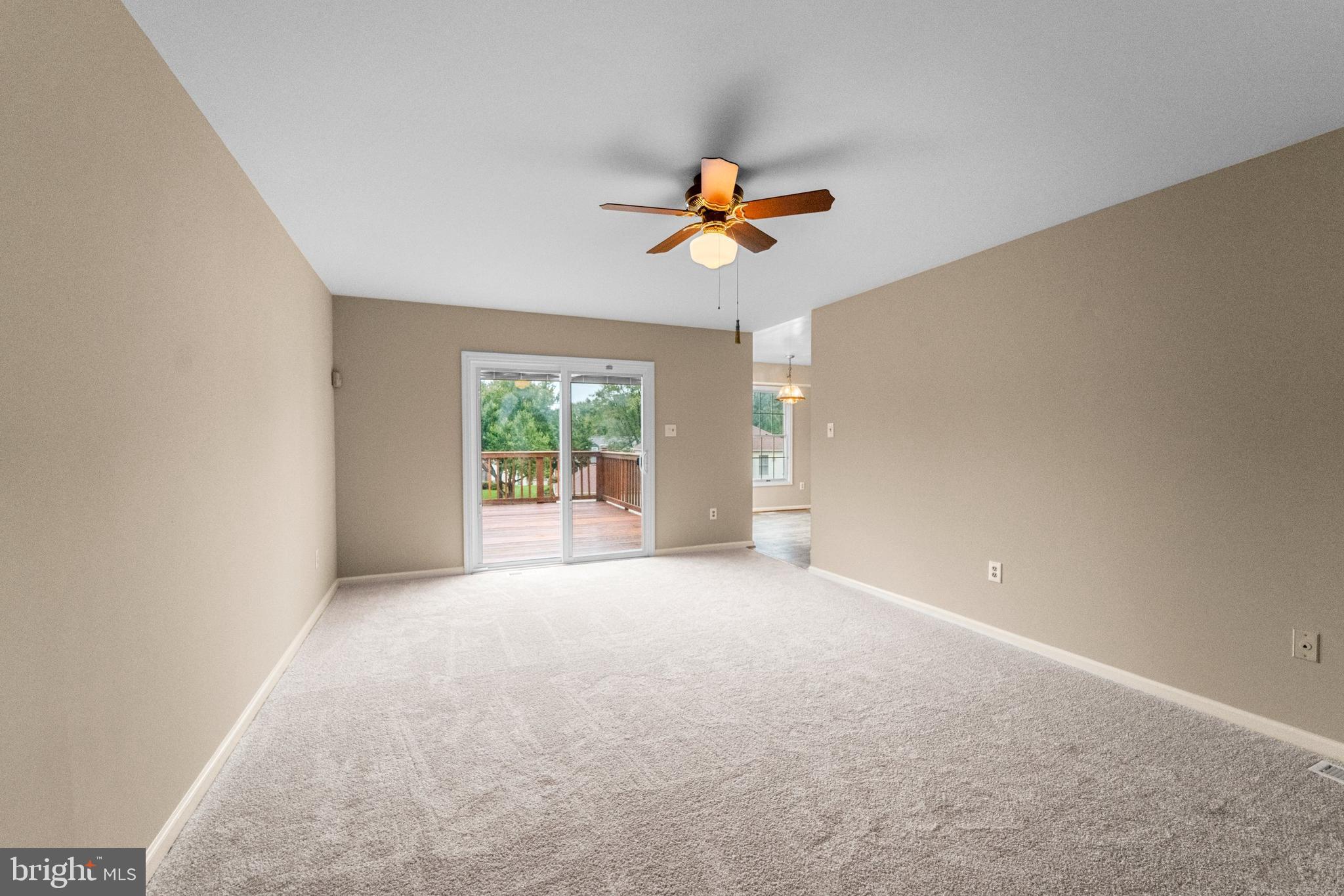 1503 Golf Course Drive Bowie, MD 20721 - Photo 13 of 60 Family Room exiting to Deck & Kitchen