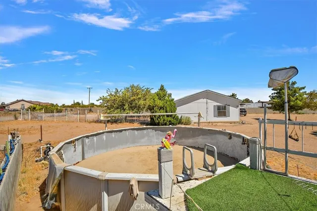 a view of a swimming pool with a lake view