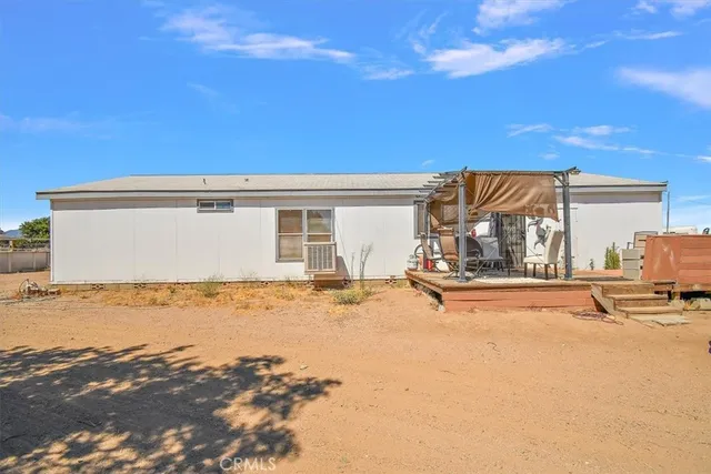 a view of a house with a patio