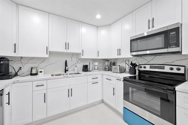 $1,049,000 | 14760 South Spur Drive, Miami, FL 33161