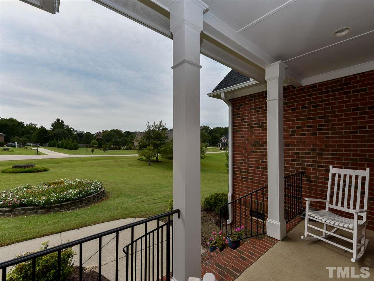 6005 Maton Place Raleigh, NC 27603 - Photo 2 of 30 a view of a balcony with lake view