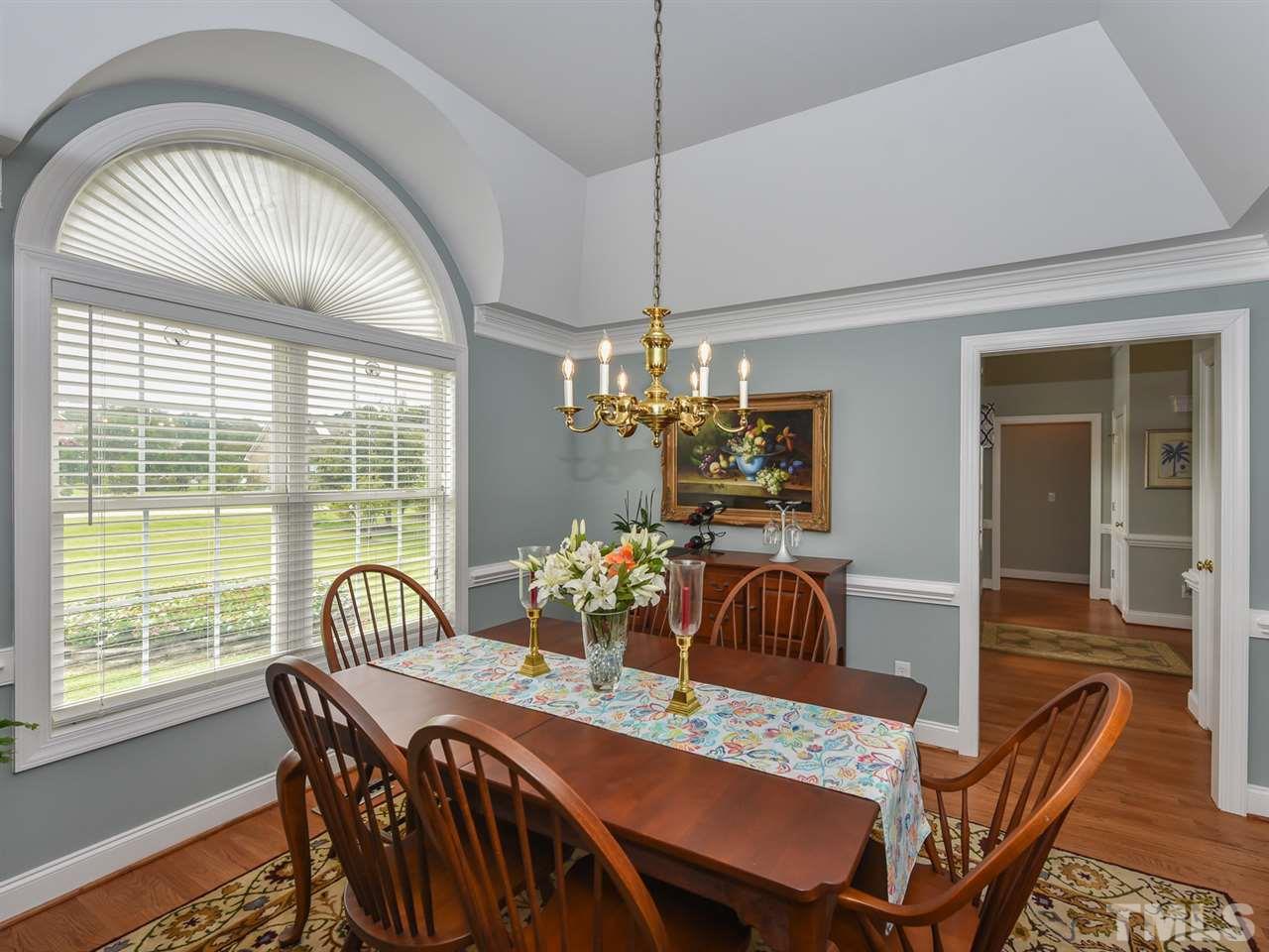 6005 Maton Place Raleigh, NC 27603 - Photo 12 of 30 a view of a dining room with furniture window and outside view