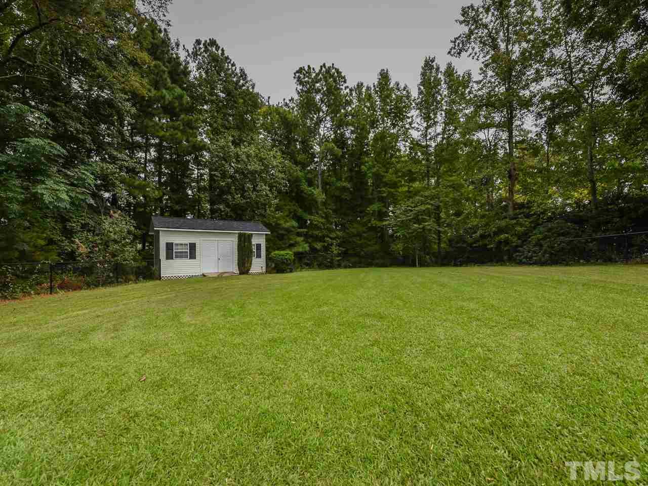 6005 Maton Place Raleigh, NC 27603 - Photo 25 of 30 a house view with a outdoor space