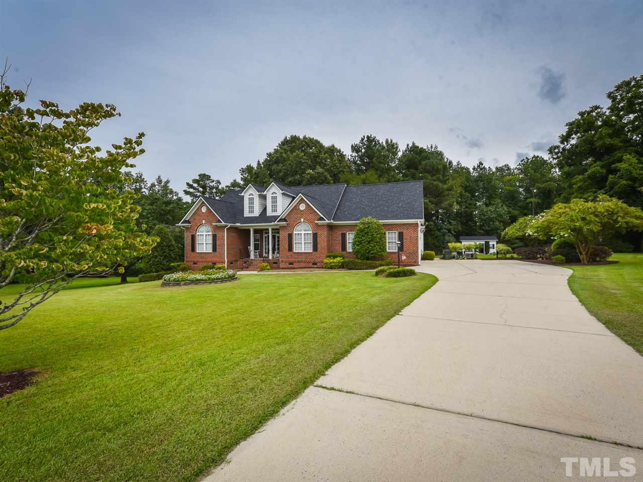 6005 Maton Place Raleigh, NC 27603 - Photo 30 of 30 a front view of house with yard and green space
